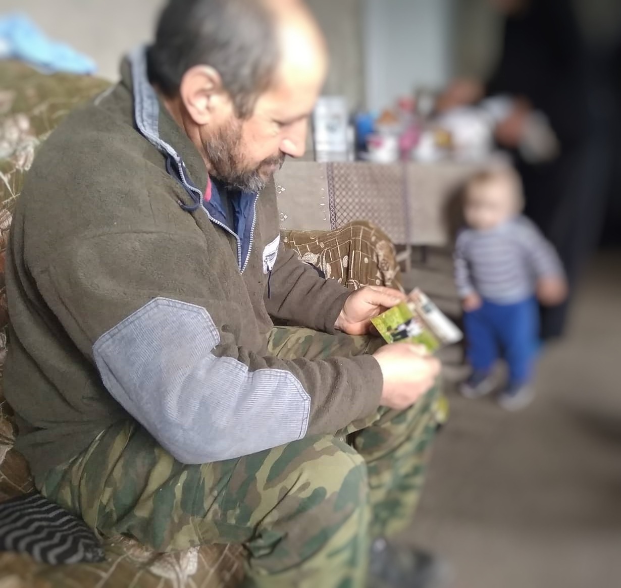 Ghvtiso Naibaidze, father of victim. He looks at his daughter’s picture