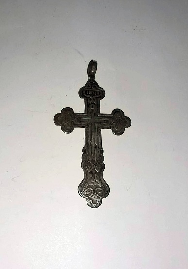 The cross Zaira Qeburia was holding while being tortured